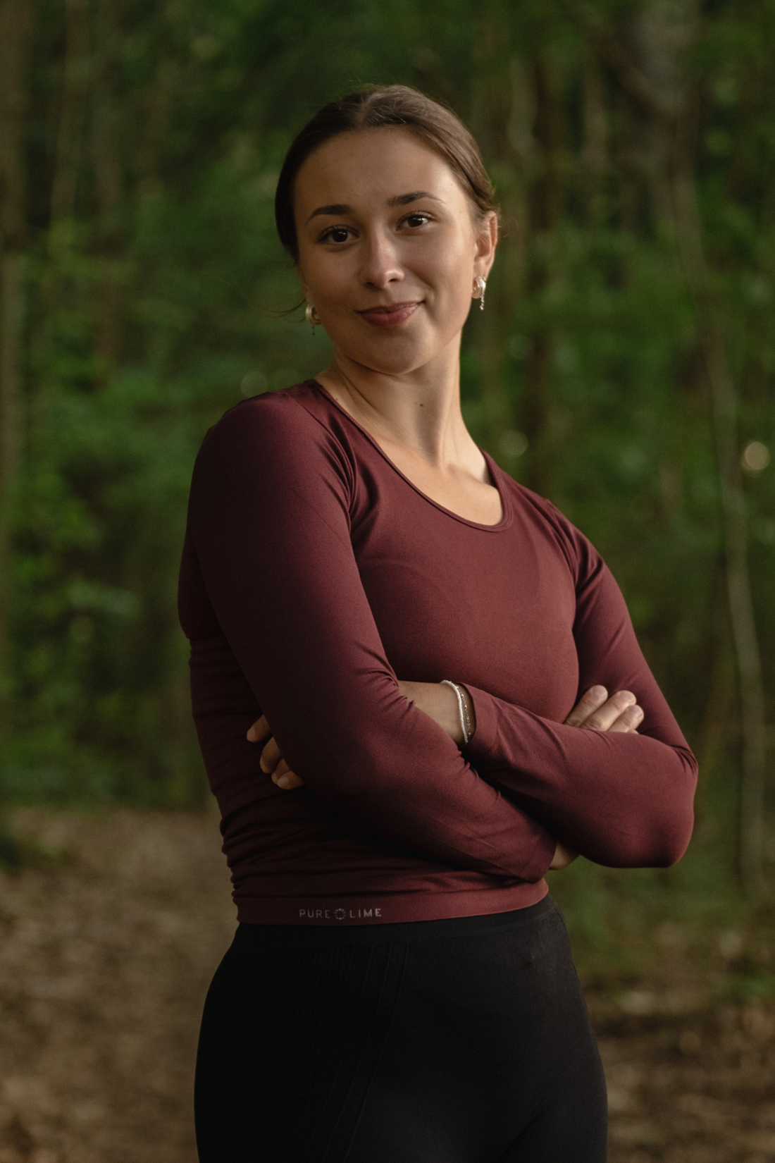 Seamless træningstrøje i farven Tawny Port, lavet af blødt og åndbart stof. Giver et feminint og tidløst look.